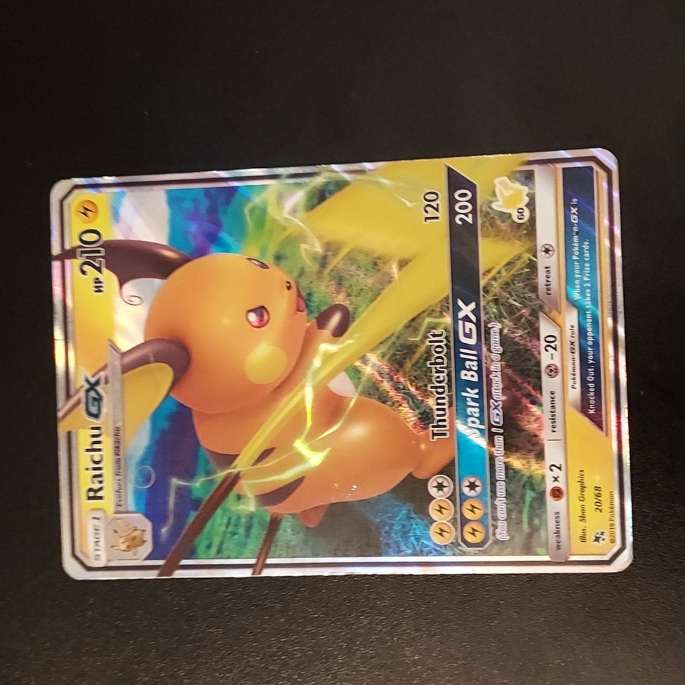 GX Holographic Raichu Pokemon Card with Lightning Energy Card